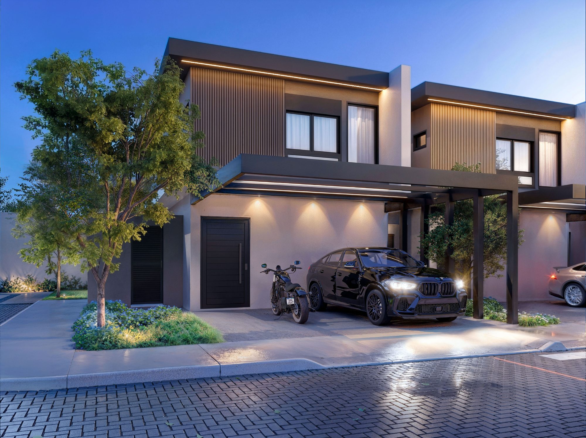 Fachada de sobrado do Park Design Residence ao anoitecer